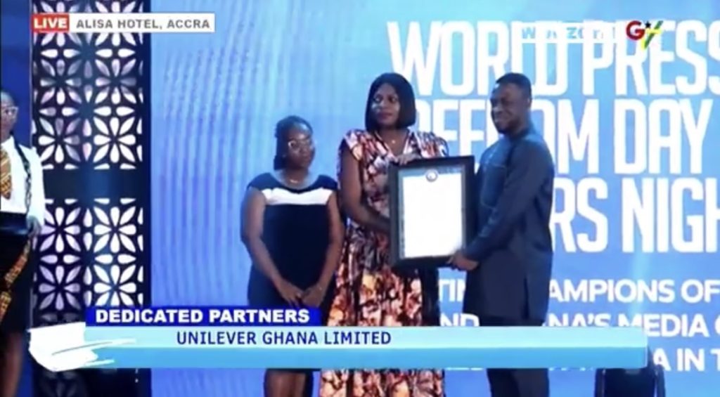 Madam Ama Hagan, Senior Legal Counsel and Company Secretary at Unilever Ghana, proudly receiving the honour on behalf of the company.